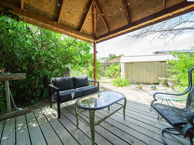 902 W 44th Pl, Kennewick, WA 99337 - wooden deck with a shed, a gazebo, and outdoor lounge area