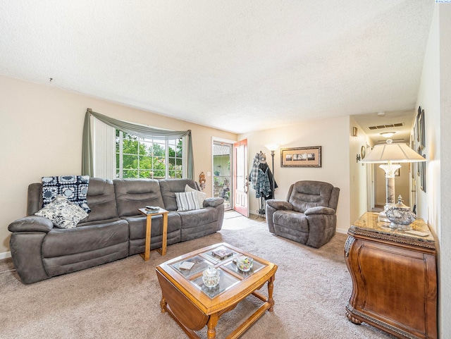 902 W 44th Pl, Kennewick, WA 99337 - carpeted living area with a textured ceiling