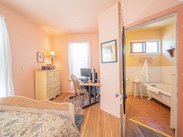 bedroom featuring light hardwood / wood-style floors