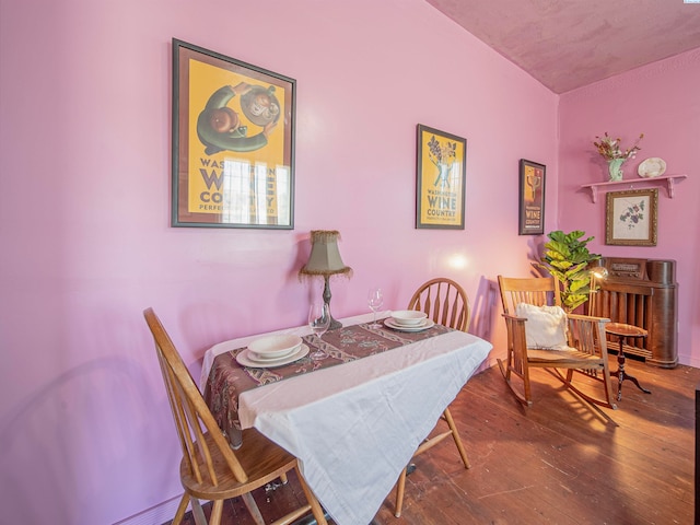 dining area featuring wood-type flooring