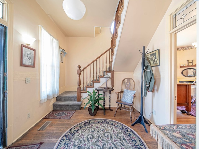 foyer entrance featuring wood-type flooring