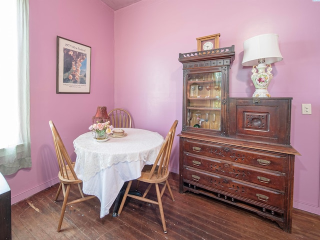 dining space featuring hardwood / wood-style flooring