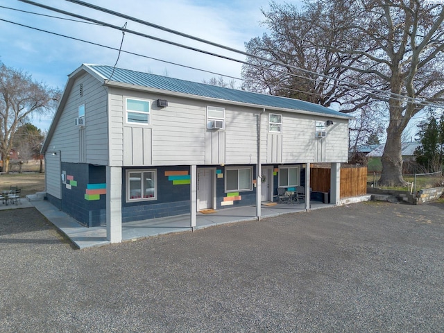 exterior space featuring metal roof