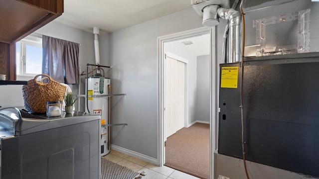 2404 Camden St, Richland, WA 99352 - utilities with strapped water heater, heating unit, and washer / clothes dryer
