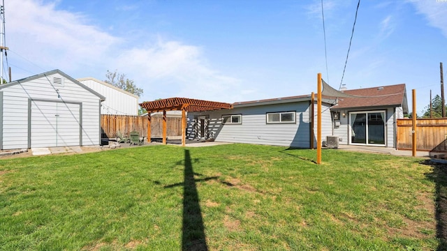 2404 Camden St, Richland, WA 99352 - rear view of property with a pergola and central air condition unit
