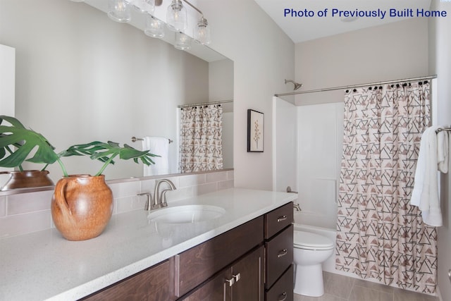 full bathroom with vanity, toilet, and shower / tub combo with curtain