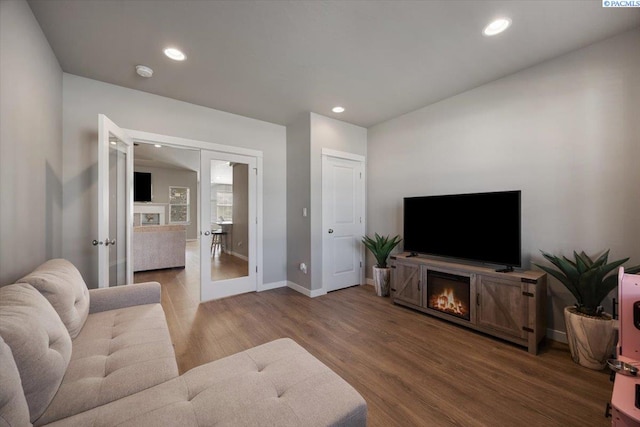 234 Ladera St, Prosser, WA 99350 - living room with french doors, wood finished floors, and recessed lighting