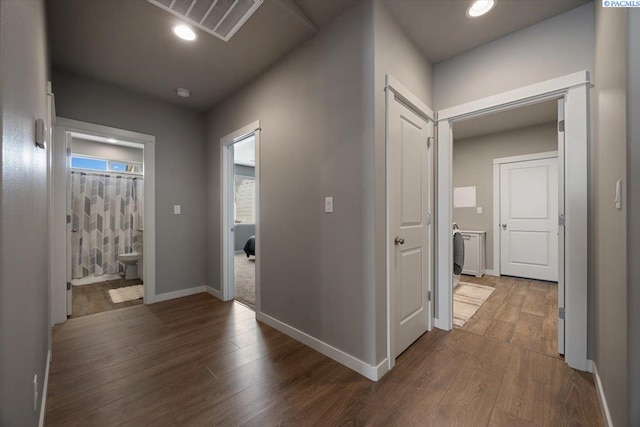 234 Ladera St, Prosser, WA 99350 - hallway with recessed lighting, visible vents, baseboards, and wood finished floors