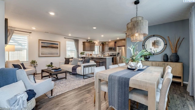 643 S Zeelar St, Kennewick, WA 99336 - dining room featuring wood finished floors, recessed lighting, and a chandelier