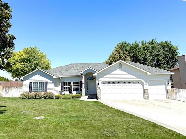 104 Center Blvd, Richland, WA 99352 - single story home with a garage, driveway, and roof with shingles