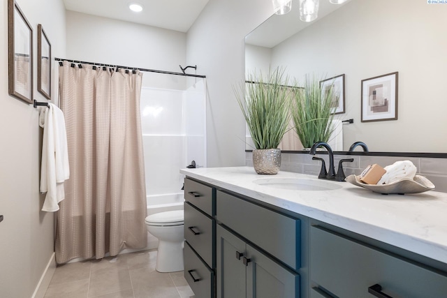 7080 W 34th Pl, Kennewick, WA 99338 - bathroom with vanity, toilet, shower / bathtub combination with curtain, and tile patterned floors