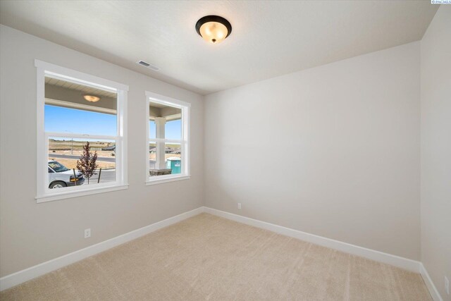 7136 W 28th Pl, Kennewick, WA 99338 - empty room featuring baseboards and light carpet