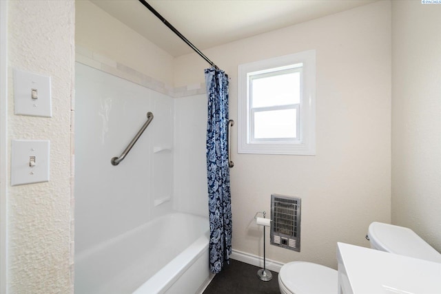 1205 N Union St, Kennewick, WA 99336 - full bathroom with heating unit, toilet, vanity, baseboards, and shower / bath combo