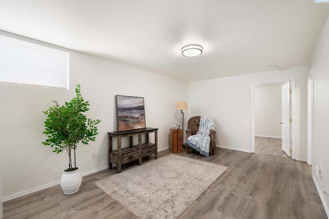 1205 N Union St, Kennewick, WA 99336 - sitting room with wood finished floors and baseboards