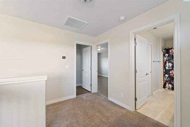 9411 Vincenzo Dr, Pasco, WA 99301 - unfurnished bedroom featuring baseboards and light carpet