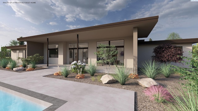 view of front facade with stucco siding