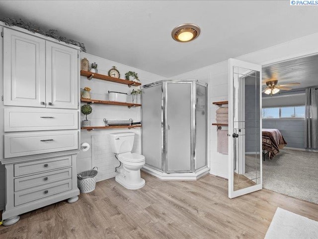 1842 Mahan Ave, Richland, WA 99354 - bathroom featuring toilet, wood finished floors, and a shower stall