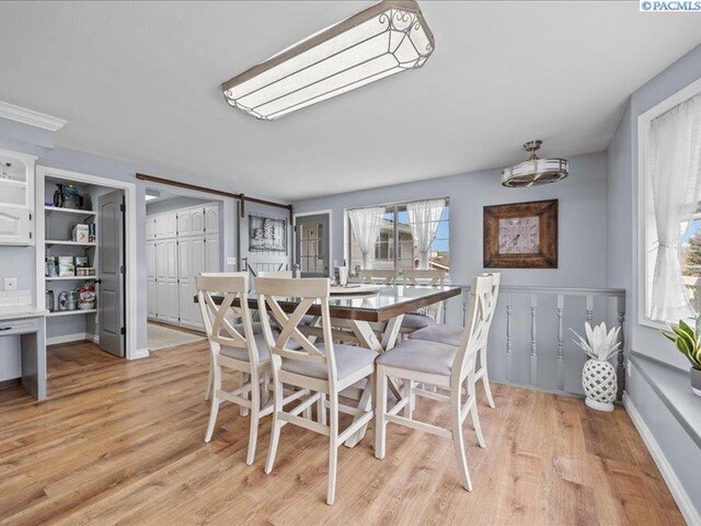 1842 Mahan Ave, Richland, WA 99354 - dining area featuring light wood finished floors and baseboards