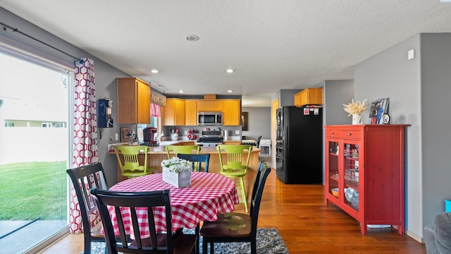 4504 S Dayton Ct, Kennewick, WA 99337 - dining room with light wood-style flooring and recessed lighting