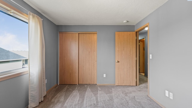 4504 S Dayton Ct, Kennewick, WA 99337 - unfurnished bedroom featuring carpet flooring and a closet