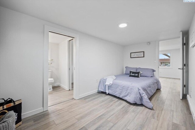 807 Snow, Richland, WA 99352 - bedroom featuring light wood-style floors and connected bathroom