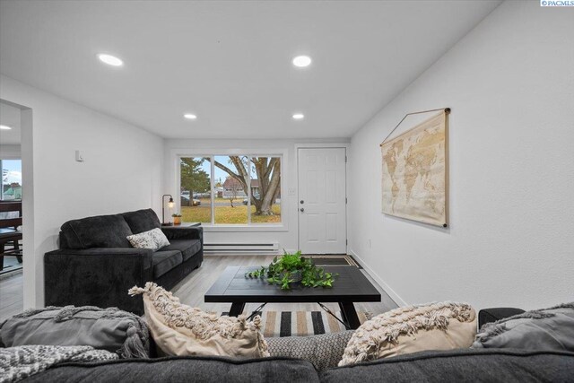 807 Snow, Richland, WA 99352 - living area featuring recessed lighting, a baseboard heating unit, and wood finished floors