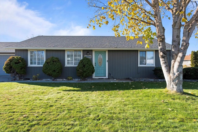 ranch-style house with a front yard