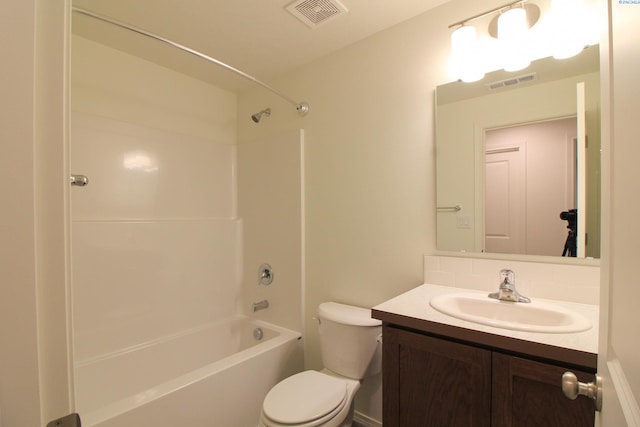 full bathroom featuring tasteful backsplash, washtub / shower combination, vanity, and toilet