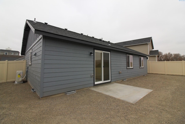 rear view of property featuring a patio area