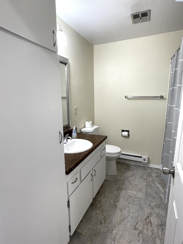 bathroom with a baseboard heating unit, toilet, visible vents, a shower with shower curtain, and vanity