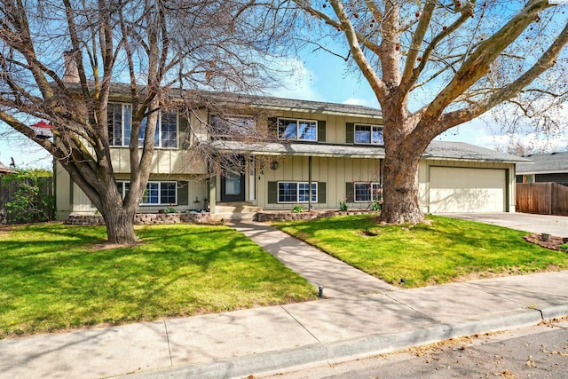 1584 Cimarron Ave, Richland, WA 99352 - view of front of property with a front lawn, fence, an attached garage, and driveway