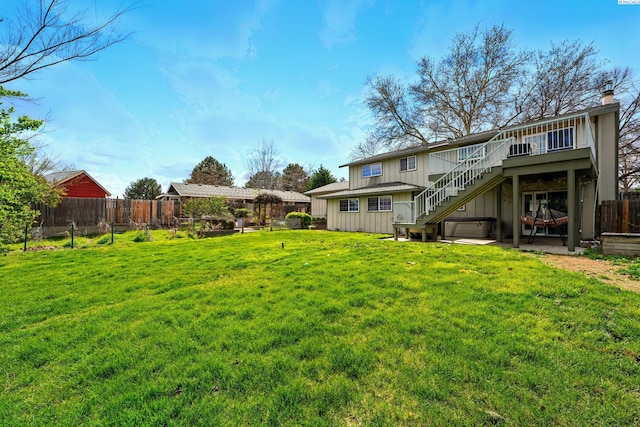 1584 Cimarron Ave, Richland, WA 99352 - view of yard with a patio, stairway, a deck, and fence