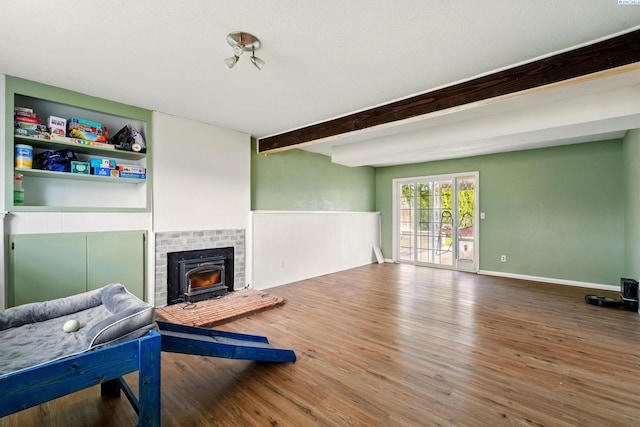 1584 Cimarron Ave, Richland, WA 99352 - living room featuring beamed ceiling, baseboards, and wood finished floors