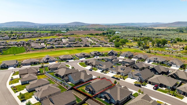 aerial view with a mountain view and a residential view