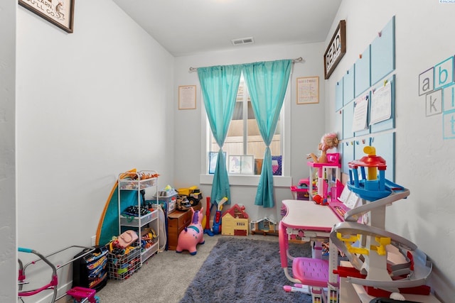 recreation room featuring visible vents and carpet floors