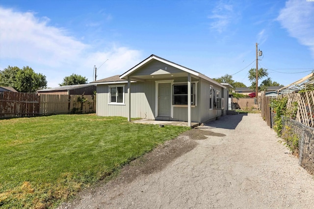 view of front of home with a front lawn