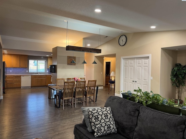 living area featuring recessed lighting, lofted ceiling, and dark wood-style floors