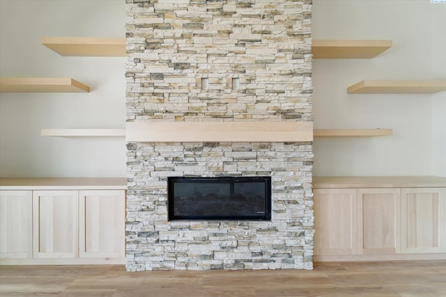 11812 Tschirky Ct, Pasco, WA 99301 - detailed view of wood finished floors and a stone fireplace