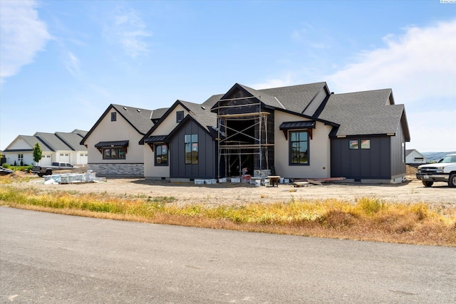 11812 Tschirky Ct, Pasco, WA 99301 - view of front of home featuring roof with shingles and board and batten siding