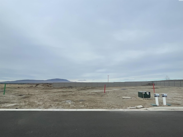 2781 Avrio Ave, Richland, WA 99354 - view of yard with a mountain view and fence