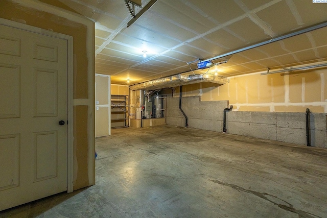 unfinished basement with water heater