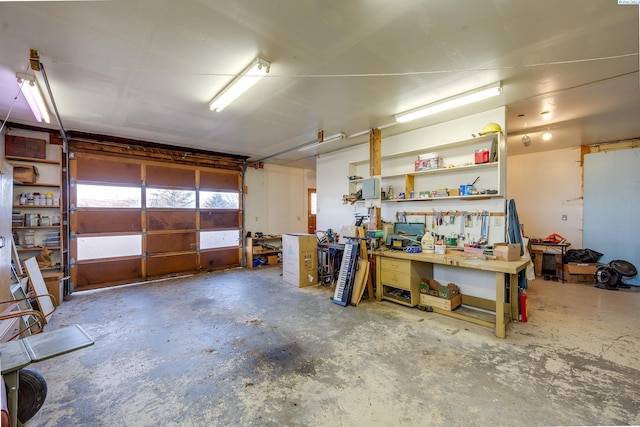 garage with a workshop area