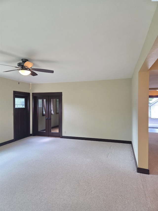6302 Sand Rd, Pullman, WA 99163 - empty room featuring carpet flooring, baseboards, and a ceiling fan
