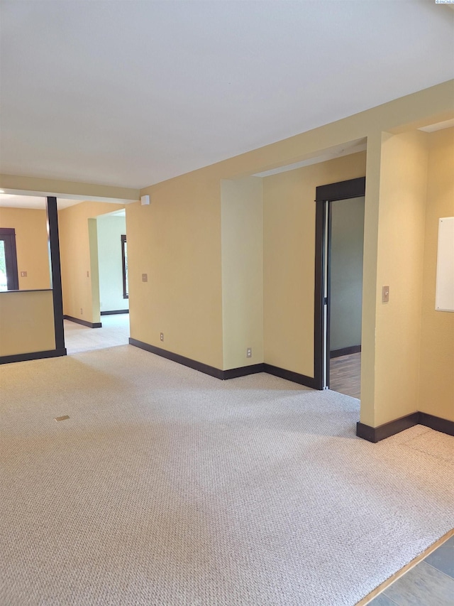 6302 Sand Rd, Pullman, WA 99163 - unfurnished room featuring light carpet and baseboards