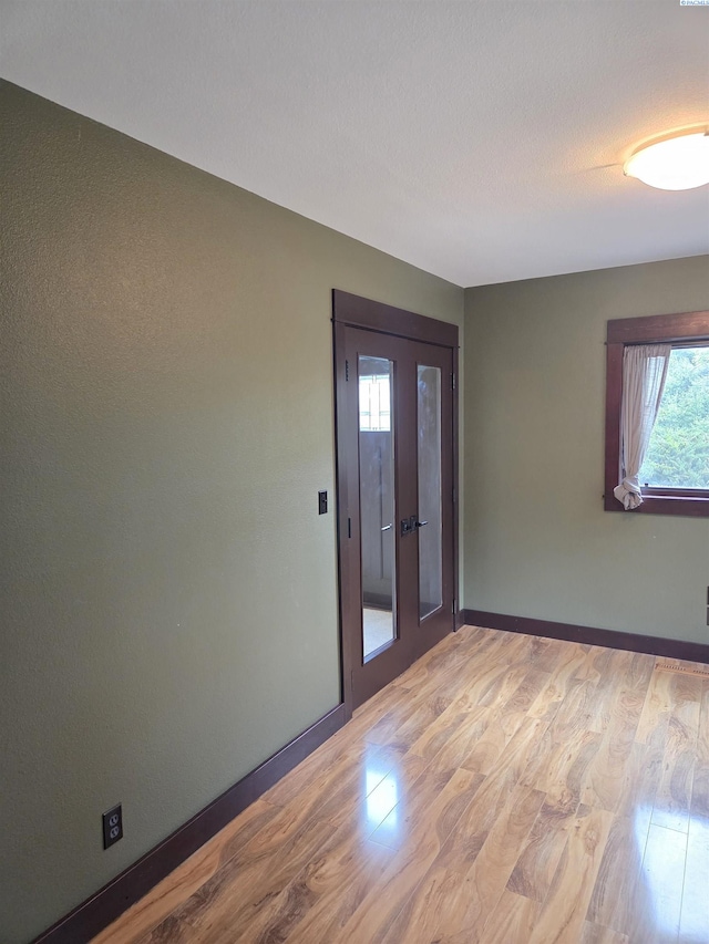 6302 Sand Rd, Pullman, WA 99163 - spare room with light wood-style floors and baseboards
