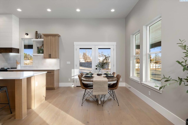 4402 Everett St, West Richland, WA 99353 - dining space featuring light hardwood / wood-style flooring and french doors