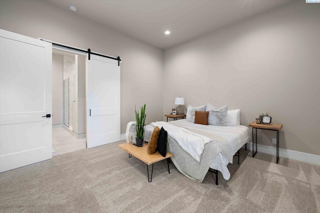 4402 Everett St, West Richland, WA 99353 - bedroom with light carpet and a barn door