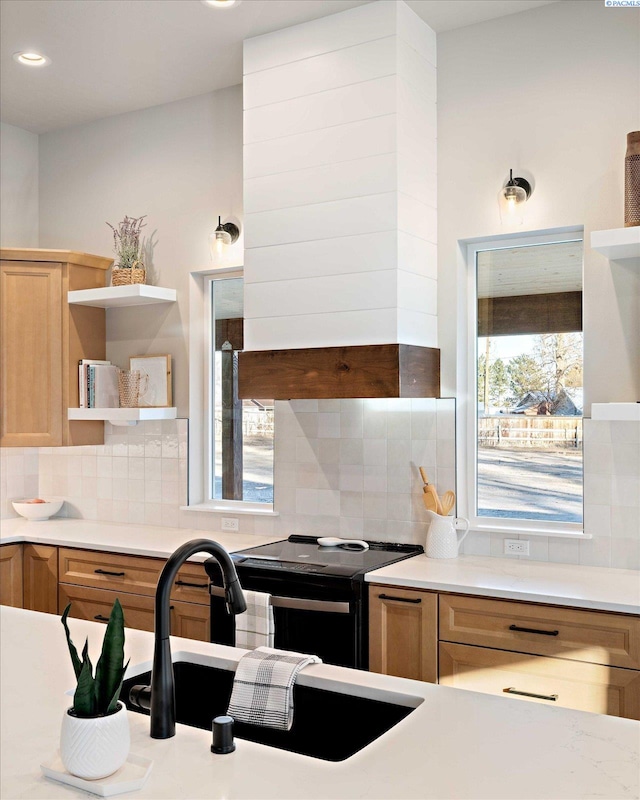 4402 Everett St, West Richland, WA 99353 - kitchen with sink, decorative backsplash, and electric range