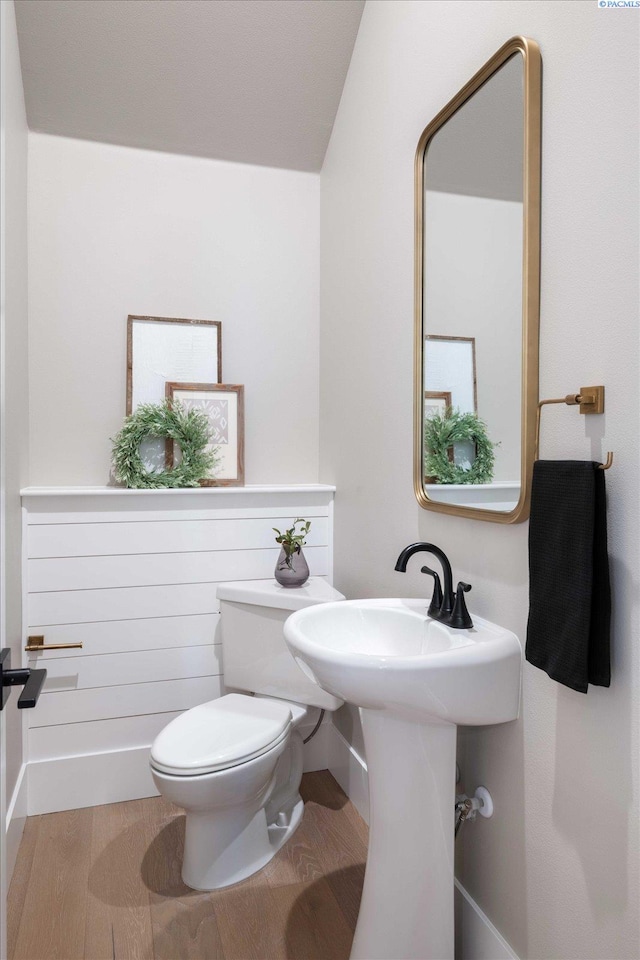 4402 Everett St, West Richland, WA 99353 - bathroom with wood-type flooring and toilet