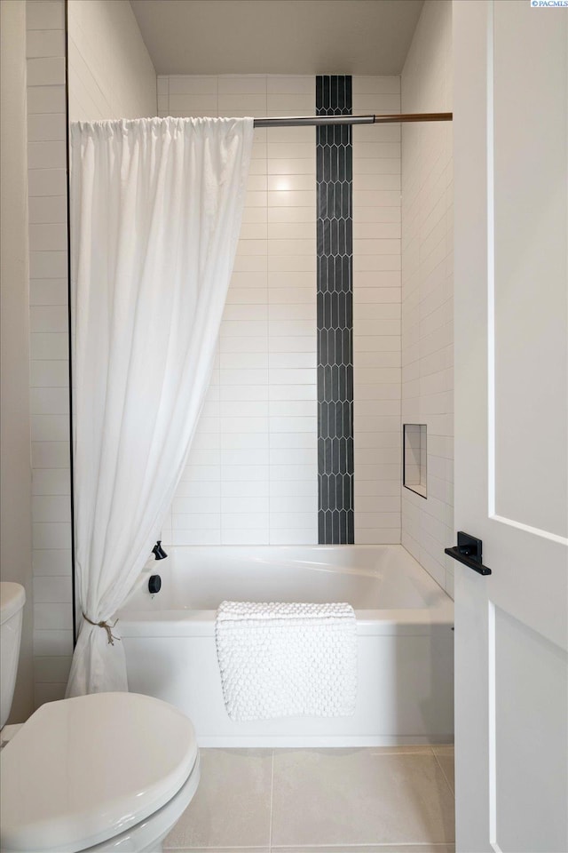 4402 Everett St, West Richland, WA 99353 - bathroom with toilet, tile patterned flooring, and shower / bath combo